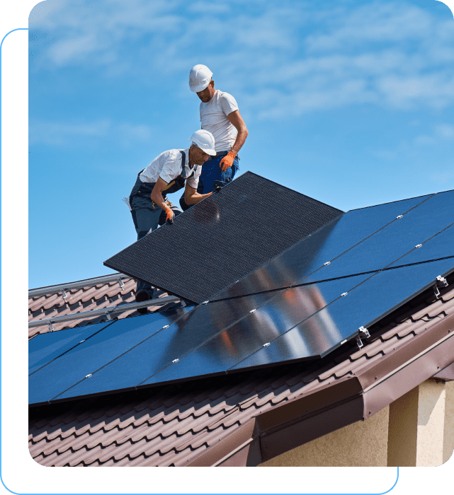Two men working on a solar panel.
